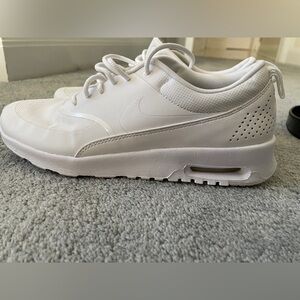 Nike white. Lightweight. Comfortable. Some wear but lots more love to give.